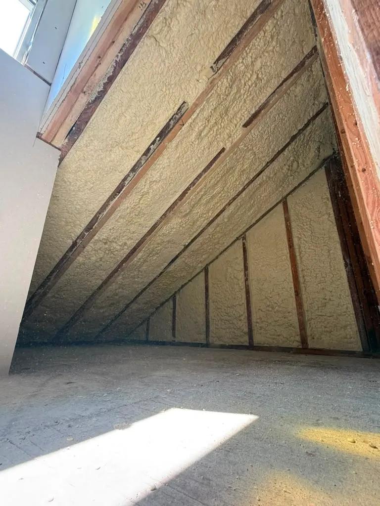 Kevin Chavez of Sky Blue Insulation working in Livingston