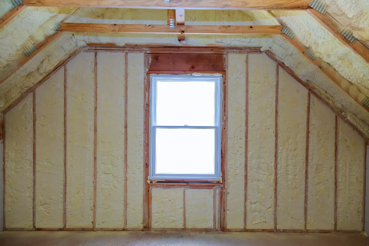 Fiberglass batt insulation between attic joists in a New Jersey home